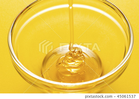 Honey in a glass plate Honey in a glass plate 45061537
