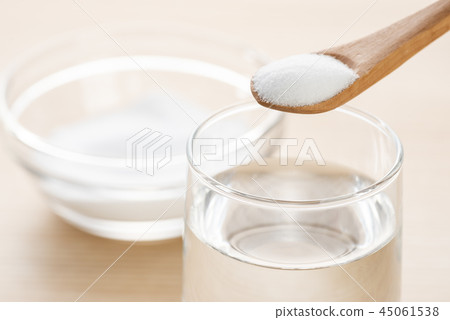 Citric acid and glass of water Citric acid and glass of water 45061538
