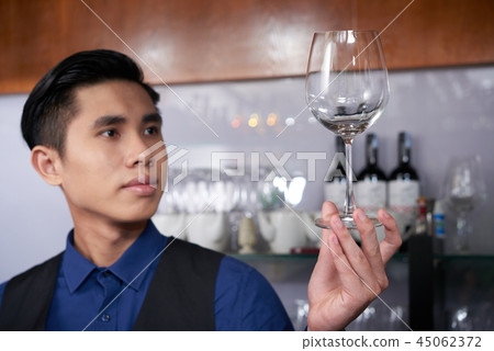 Waiter with wine glass Waiter with wine glass 45062372