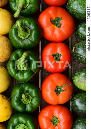 Cucumbers, tomatoes and sweet pepper  45063174