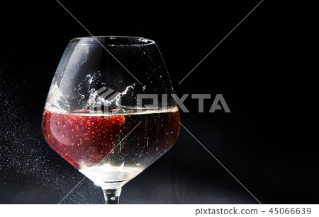 Strawberries put in white wine glass Strawberries put in white wine glass 45066639