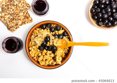 Breakfast cereals with berry fruit in a bowl Breakfast cereals with berry fruit in a bowl 45069813