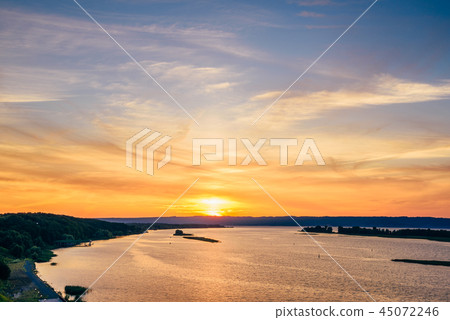 Sunset on river shore. Sunset on river shore. 45072246
