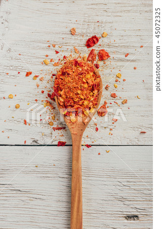 Spoonful of crushed chili pepper Spoonful of crushed chili pepper 45072325