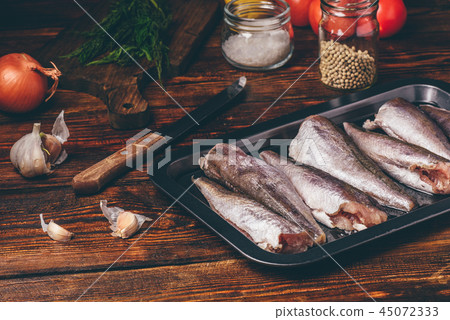 Hake carcasses on baking sheet 45072333