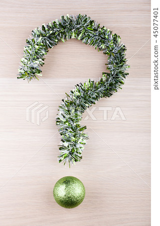 Tinsel question mark new year toy ball wooden tabl Tinsel question mark new year toy ball wooden tabl 45077401