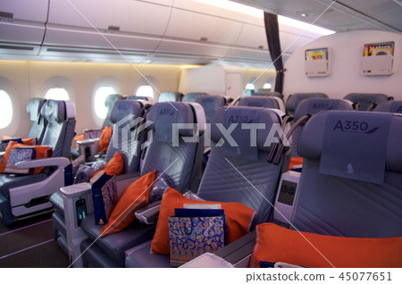 DUSSELDORF - JULY 22, 2016: Singapore Airlines Premium Economy Class on board of Airbus A350 45077651