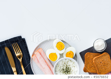 Healthy breakfast. Boiled eggs, ham and cheese 45078832