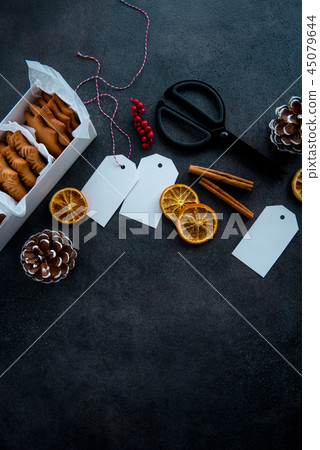 Gift wrapping of Christmas cookies. Gift wrapping of Christmas cookies. 45079644