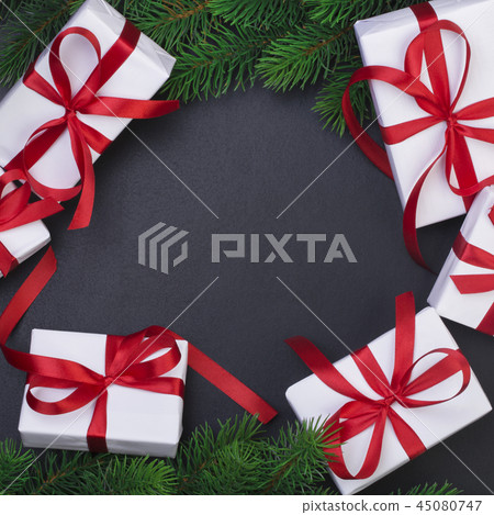 Christmas tree branch and gift Christmas tree branch and gift 45080747