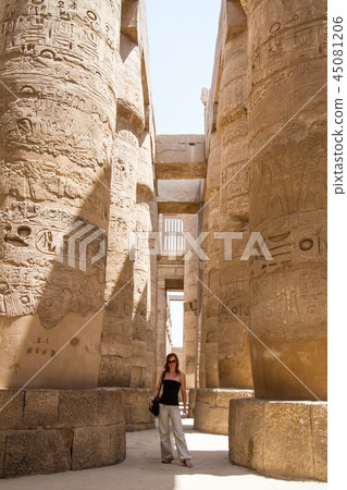 Female Tourist at Temples of Karnak, ancient Thebes in Luxor, Egypt 45081206