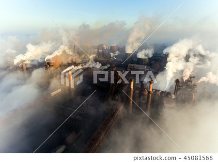 Industrial city of Mariupol, Ukraine, in the smoke of industrial plants and fog at dawn. Industrial city of Mariupol, Ukraine, in the smoke of industrial plants and fog at dawn. 45081568
