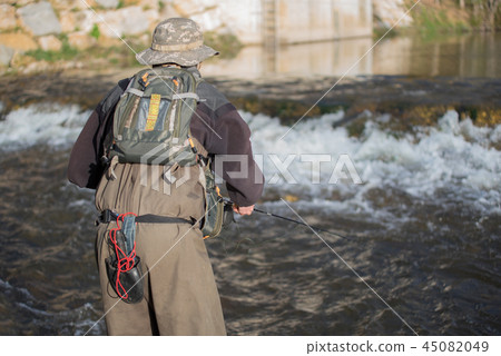 Young man flyfishing on the river 45082049