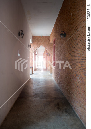 Light at the end of corridor. Ancient walk way Light at the end of corridor. Ancient walk way 45082748