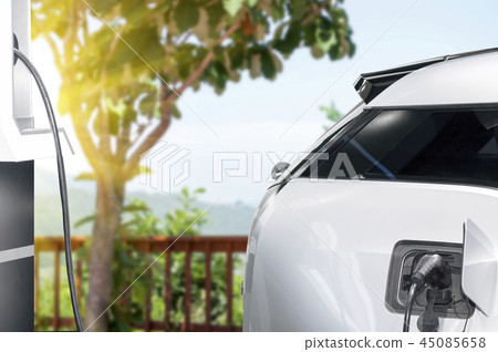 Connect charging station and charger to charge eco-friendly electric car 45085658