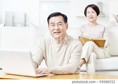 Reading, Laptop, Living Room, Couple Reading, Laptop, Living Room, Couple 45086552