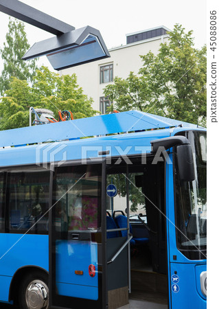 Electric bus at a stop Electric bus at a stop 45088086