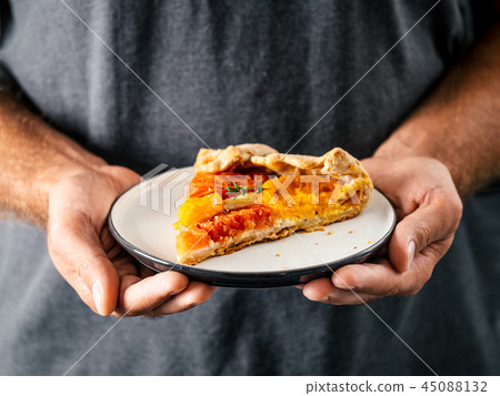 tomatoes and cheese tart or galette 45088132