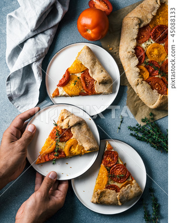 tomatoes and cheese tart or galette 45088133