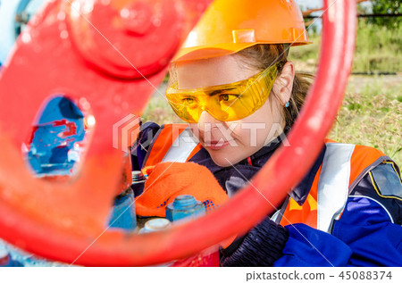 Woman worker in the oilfield Woman worker in the oilfield 45088374