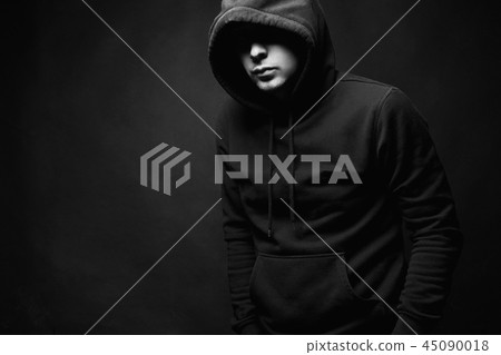 Man in Hood. Boy in a hooded sweatshirt Man in Hood. Boy in a hooded sweatshirt 45090018