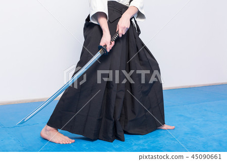 A man with katana on Iaido practice 45090661