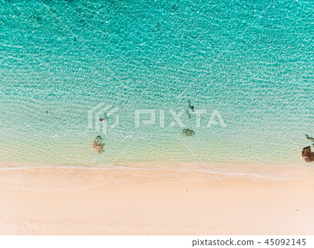 Top view of paradise beach with turquoise ocean Top view of paradise beach with turquoise ocean 45092145