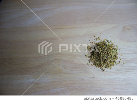Dried Oregano on the wooden prepared for cooking Dried Oregano on the wooden prepared for cooking 45093493