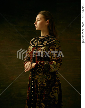 Girl standing in Russian traditional costume. Girl standing in Russian traditional costume. 45096950