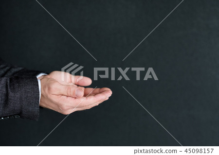 man holding invisible object hand palm advertising 45098157