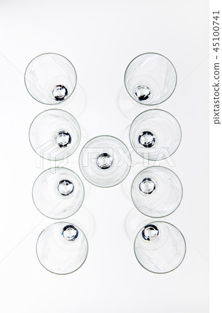 alphabet Empty champagne glass white background alphabet Empty champagne glass white background 45100741