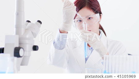 woman scientist take test tube 45105969