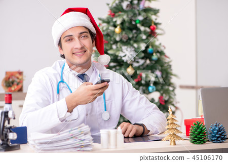 Doctor on the shift on christmas eve Doctor on the shift on christmas eve 45106170
