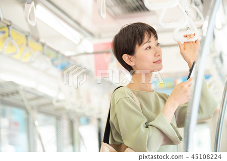 Commercial woman train commuting photography cooperation: Keio Electric Railway Co., Ltd. Commercial woman train commuting photography cooperation: Keio Electric Railway Co., Ltd. 45108224