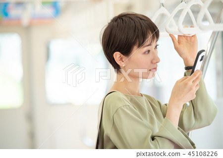 Commercial woman train commuting photography cooperation: Keio Electric Railway Co., Ltd. Commercial woman train commuting photography cooperation: Keio Electric Railway Co., Ltd. 45108226