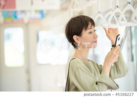 Commercial woman train commuting photography cooperation: Keio Electric Railway Co., Ltd. 45108227