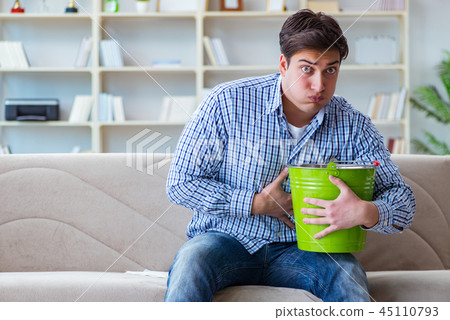 Sick man suffering at home from infection and bad stomach 45110793