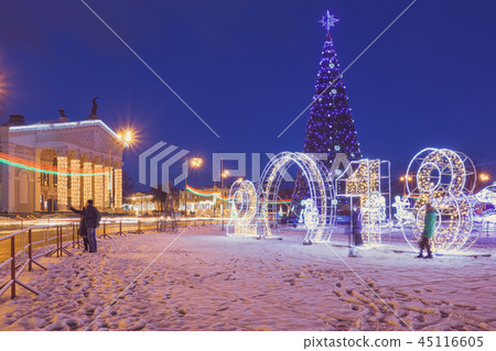Festive decor on town square with a Christmas tree 45116605