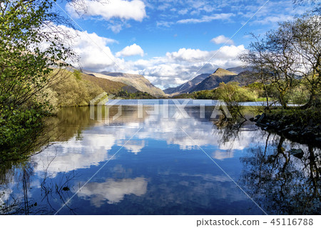Reflections at Llyn Padarn with Dolbadarn Castle at Llanberis in Snowdonia National Park in Reflections at Llyn Padarn with Dolbadarn Castle at Llanberis in Snowdonia National Park in 45116788