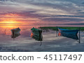 boat reflections at sunset 45117497