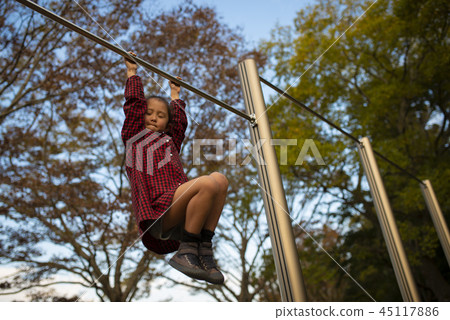 Girls playing with iron bars 45117886