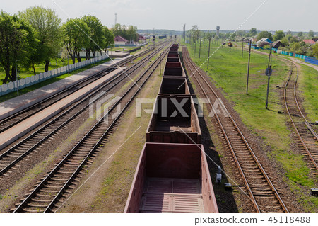 Railroad in motion at sunset. Railway station with Railroad in motion at sunset. Railway station with 45118488