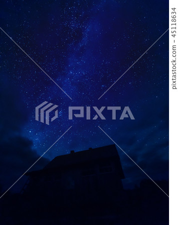 Star tracks upon village house. Starry night sky Star tracks upon village house. Starry night sky 45118634