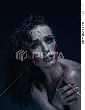 Beautiful girl with scar on her face in the blood Beautiful girl with scar on her face in the blood 45121354