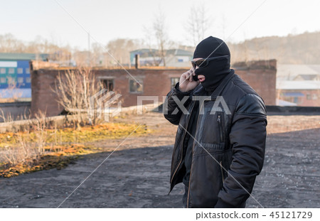 a bandit talking on the phone 45121729