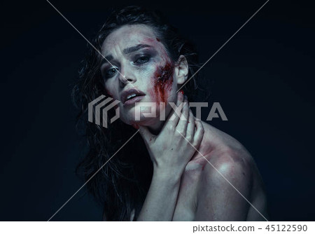 Beautiful girl with scar on her face in the blood Beautiful girl with scar on her face in the blood 45122590