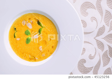 healhty homemade pumpkin soup with herbs healhty homemade pumpkin soup with herbs 45123256
