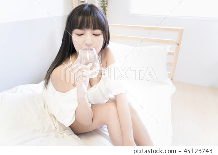Beautiful girl drinking water Beautiful girl drinking water 45123743