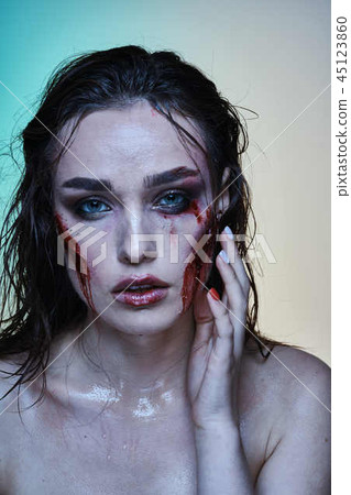 Beautiful girl with a wounded face in the blood Beautiful girl with a wounded face in the blood 45123860