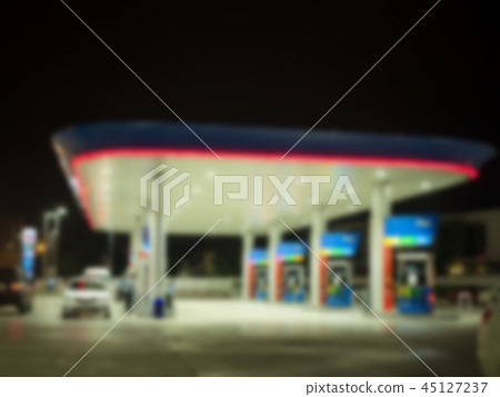 Blur gas station at night twilight. 45127237